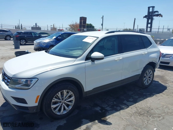 2019 Volkswagen Tiguan S with VIN 3VV1B7AX1KM101407, listed as a IAAI auction lot 42032761 with 51,868 mi miles. Bid and sale history available at carsss.com. Image 2.