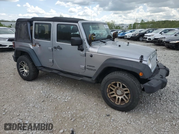 2013 Jeep Wrangler Unlimited Sport z VIN 1C4BJWDG2DL685896, wystawiony jako Copart lot #53951415 z przebiegiem 142 516 mil mil oraz Tytuł czysty. Historia ofert i sprzedaży dostępna na DreamBid. Obrazek 4.