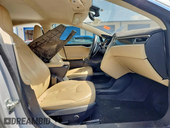 2013 Tesla Model S with VIN 5YJSA1CG5DFP03704, listed as a Copart auction lot 65143565 with Not provided miles and Clean title. Bid and sale history available at DreamBid. Image 7.