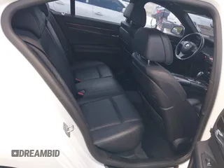 2014 BMW 7 Series 740i with VIN WBAYA6C53ED144195, listed as a IAAI auction lot 41720500 with 123,776 mi miles and . Bid and sale history available at DreamBid. Image 8.