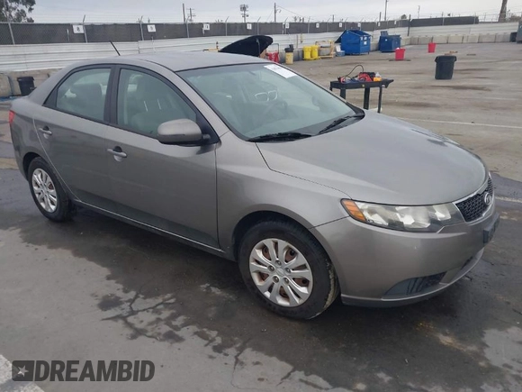2011 Kia Forte EX with VIN KNAFU4A25B5441194, listed as a IAAI auction lot 42076839 with 91,706 mi miles. Bid and sale history available at carsss.com. Image 1.