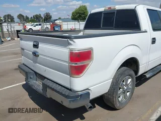 2014 Ford F-150 XL with VIN 1FTFW1CT8EKF55164, listed as a IAAI auction lot 42111483 with 233,166 mi miles. Bid and sale history available at carsss.com. Image 19.