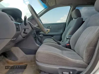2000 Toyota Camry CE с VIN JT2BG22KXY0391368, выставлен на аукционе Copart как лот 59923575 с пробегом 220 660 миль миль и Списание • Salvage title. История ставок и продаж доступна на DreamBid. Изображение 7.