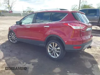 2016 Ford Escape SE z VIN 1FMCU9G91GUA83186, wystawiony jako IAAI lot #42190519 z przebiegiem 103 583 mil mil oraz . Historia ofert i sprzedaży dostępna na DreamBid. Obrazek 3.