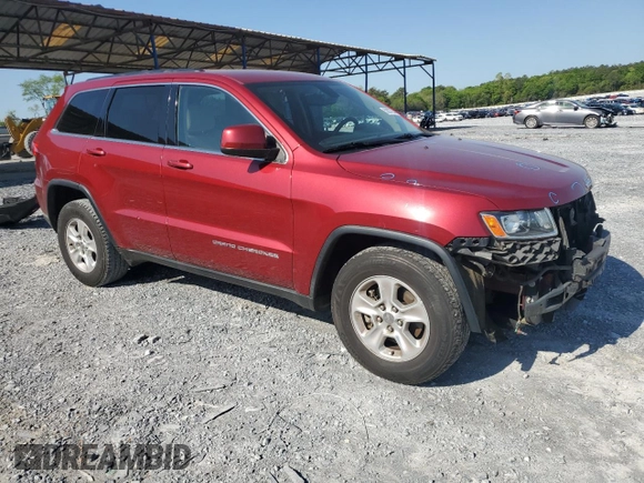 2014 Jeep Grand Cherokee Laredo with VIN 1C4RJEAG7EC274573, listed as a Copart auction lot 52637255 with 156,409 mi miles and Salvage Title. Bid and sale history available at DreamBid. Image 4.