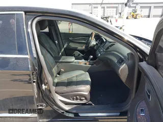 2014 Chevrolet Impala LTZ with VIN 1G1155S30EU123476, listed as a IAAI auction lot 41878992 with 116,090 mi miles and . Bid and sale history available at DreamBid. Image 5.