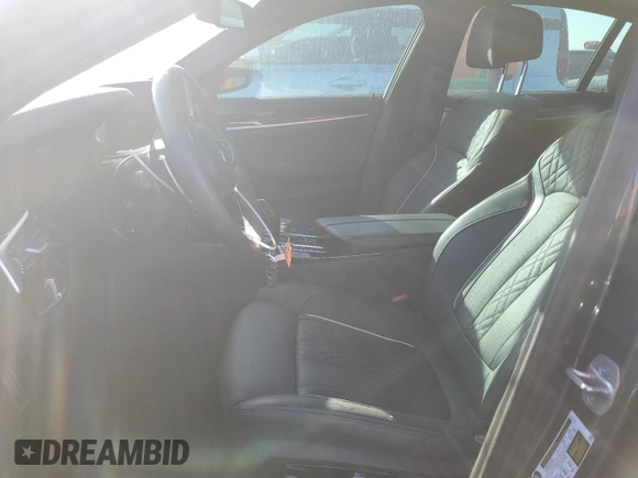 2023 BMW 5 Series M550i xDrive with VIN WBA13BK08PCN51125, listed as a Copart auction lot 76781294 with 8,855 mi miles and Non repairable. Bid and sale history available at DreamBid. Image 7.