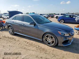 2014 Mercedes-Benz E 350 Sport with VIN WDDHF5KB0EB023003, listed as a Copart auction lot 58072945 with 130,393 mi miles and Salvage title. Bid and sale history available at DreamBid. Image 4.