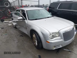 2010 Chrysler 300 C Hemi with VIN 2C3CA6CT5AH141439, listed as a IAAI auction lot 40797974 with 213,843 mi miles and . Bid and sale history available at carsss.com. Image 1.