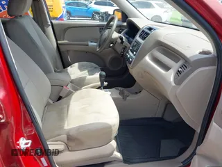 2009 Kia Sportage LX with VIN KNDJE723897599966, listed as a IAAI auction lot 42107627 with 118,512 mi miles. Bid and sale history available at carsss.com. Image 5.