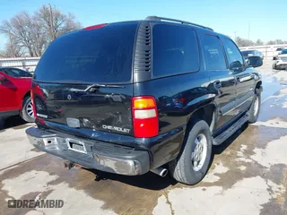 2003 Chevrolet Tahoe LS with VIN 1GNEC13V63R245581, listed as a IAAI auction lot 41599241 with 234,028 mi miles. Bid and sale history available at carsss.com. Image 4.