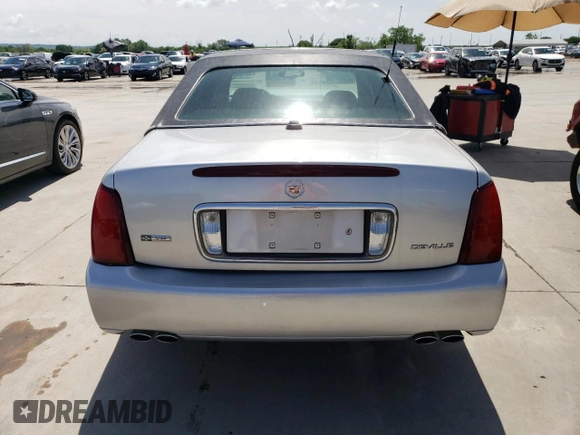 2004 Cadillac DeVille z VIN 1G6KD54Y14U196655, wystawiony jako Copart lot #50882364 z przebiegiem 80 588 mil mil oraz Szkody całkowita. Historia ofert i sprzedaży dostępna na DreamBid. Obrazek 6.