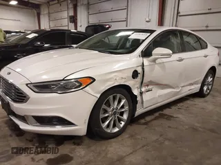 2018 Ford Fusion Energi SE with VIN 3FA6P0PU9JR264257, listed as a IAAI auction lot 41587659 with 85,832 mi miles. Bid and sale history available at carsss.com. Image 2.
