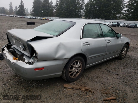 2004 Mitsubishi Diamante LS z VIN 6MMAP67P34T003796, wystawiony jako Copart lot #81683284 z przebiegiem 127 882 mil mil oraz Szkody całkowita. Historia ofert i sprzedaży dostępna na DreamBid. Obrazek 3.
