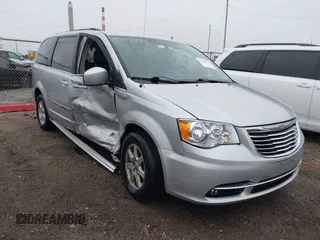 2012 Chrysler Town & Country Touring with VIN 2C4RC1BGXCR213014, listed as a IAAI auction lot 41997723 with 143,848 mi miles. Bid and sale history available at carsss.com. Image 6.