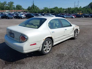 2003 Nissan Maxima GLE with VIN JN1DA31A03T421052, listed as a IAAI auction lot 42556685 with 240,183 mi miles and . Bid and sale history available at DreamBid. Image 4.