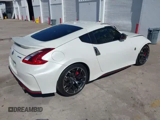 2019 Nissan 370Z Sport Touring with VIN JN1AZ4EH1KM420123, listed as a IAAI auction lot 41995950 with 82,678 mi miles and . Bid and sale history available at DreamBid. Image 4.