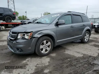 2012 Dodge Journey SXT z VIN 3C4PDDBG7CT183148, wystawiony jako Copart lot #55614685 z przebiegiem 182 263 mil mil oraz Szkoda całkowita • Salvage title. Historia ofert i sprzedaży dostępna na DreamBid. Obrazek 1.