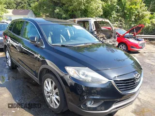 2014 Mazda CX-9 Grand Touring z VIN JM3TB2DA1E0440457, wystawiony jako IAAI lot #42153251 z przebiegiem 147 386 mil mil oraz . Historia ofert i sprzedaży dostępna na DreamBid. Obrazek 1.