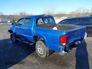 2018 Toyota Tacoma SR with VIN 3TMCZ5AN3JM138480, listed as a IAAI auction lot 41080910 with 99,225 mi miles. Bid and sale history available at carsss.com. Image 3.