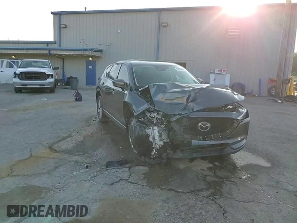 2019 Mazda CX-5 Grand Touring with VIN JM3KFBDM9K0676795, listed as a Copart auction lot 52129885 with 71,869 mi miles and Salvage Title. Bid and sale history available at carsss.com. Image 14.