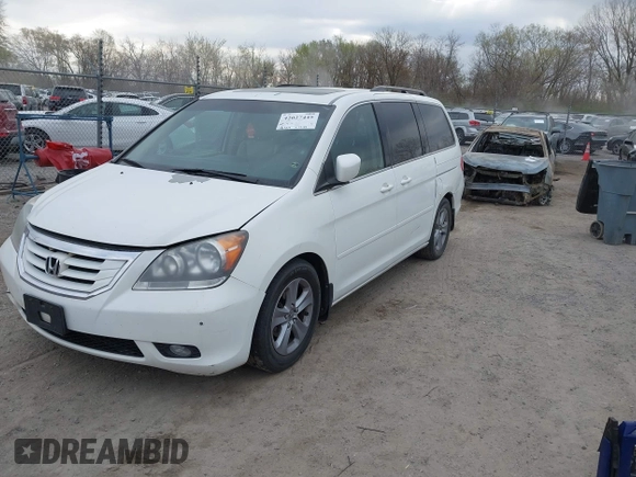 2010 Honda Odyssey Touring with VIN 5FNRL3H99AB005395, listed as a IAAI auction lot 42027445 with 181,559 mi miles. Bid and sale history available at carsss.com. Image 2.
