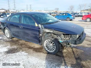 2014 Volkswagen Passat Wolfsburg Ed with VIN 1VWAT7A37EC040656, listed as a IAAI auction lot 41271240 with 161,780 mi miles. Bid and sale history available at carsss.com. Image 1.