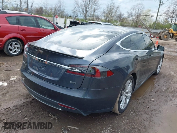 2015 Tesla Model S 85D with VIN 5YJSA1E21FF116775, listed as a IAAI auction lot 41876772 with 128,805 mi miles. Bid and sale history available at carsss.com. Image 4.