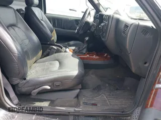 1997 Oldsmobile Bravada z VIN 1GHDT13W3V2707243, wystawiony jako IAAI lot #42024114 z przebiegiem 185 219 mil mil oraz . Historia ofert i sprzedaży dostępna na DreamBid. Obrazek 5.