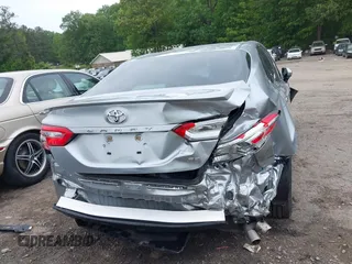 2018 Toyota Camry LE z VIN 4T1B11HK3JU129549, wystawiony jako IAAI lot #42159243 z przebiegiem 76 299 mil mil oraz . Historia ofert i sprzedaży dostępna na DreamBid. Obrazek 17.