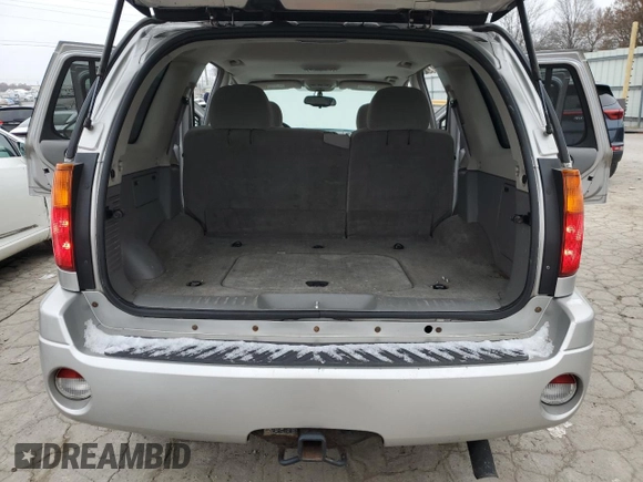 2005 GMC Envoy SLT with VIN 1GKDS13S452258553, listed as a Copart auction lot 82888944 with 174,546 mi miles and Salvage Title. Bid and sale history available at carsss.com. Image 13.