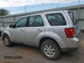 2011 Mazda Tribute Touring with VIN 4F2CY0C70BKM06723, listed as a Copart auction lot 80783624 with 218,372 mi miles and Salvage Title. Bid and sale history available at carsss.com. Image 2.