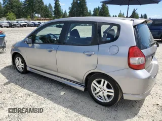 2007 Honda Fit Sport with VIN JHMGD37617S043208, listed as a Copart auction lot 64594825 with 210,672 mi miles and Clean title. Bid and sale history available at DreamBid. Image 2.