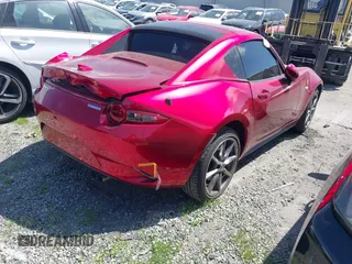 2021 Mazda MX-5 Miata Grand Touring с VIN JM1NDAM71M0459437, выставлен на аукционе IAAI как лот 41808704 с пробегом 19 368 миль миль и . История ставок и продаж доступна на DreamBid. Изображение 4.