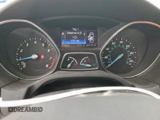 2013 Ford Focus SE z VIN 1FADP3F23DL108047, wystawiony jako Copart lot #57450795 z przebiegiem 67 518 mil mil oraz Szkoda całkowita • Salvage title. Historia ofert i sprzedaży dostępna na DreamBid. Obrazek 9.