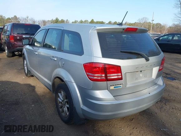 2014 Dodge Journey SE with VIN 3C4PDCAB1ET247218, listed as a IAAI auction lot 41760408 with 148,591 mi miles and . Bid and sale history available at carsss.com. Image 3.