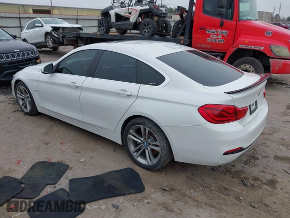 2018 BMW 4 Series 440i with VIN WBA4J5C56JBF07087, listed as a IAAI auction lot 41421921 with 61,601 mi miles and . Bid and sale history available at DreamBid. Image 3.