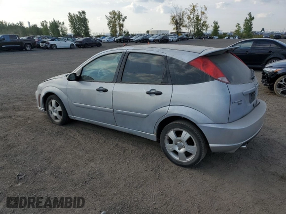 2007 Ford Focus S with VIN 1FAFP37N77W337626, listed as a Copart auction lot 70451294 with 174,068 mi miles and Salvage Title. Bid and sale history available at carsss.com. Image 2.