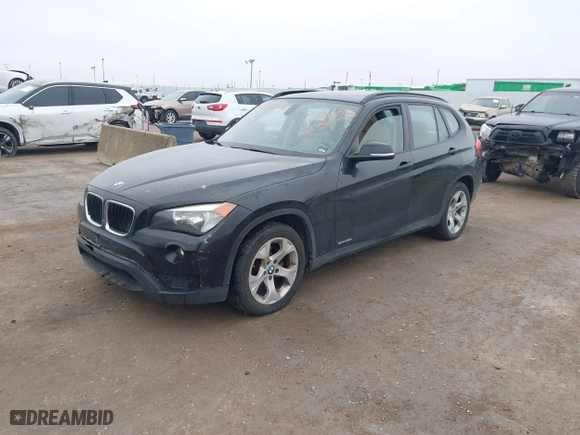 2014 BMW X1 sDrive28i with VIN WBAVM1C58EVW48622, listed as a IAAI auction lot 41531855 with 90,102 mi miles. Bid and sale history available at carsss.com. Image 2.