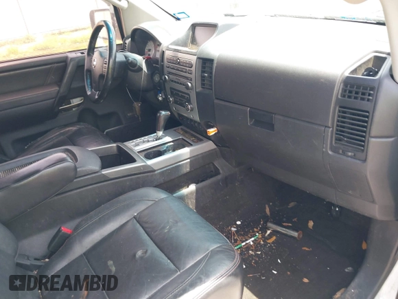 2012 Nissan Titan SL with VIN 1N6BA0EC1CN326919, listed as a IAAI auction lot 42630368 with 230,215 mi miles and . Bid and sale history available at DreamBid. Image 5.