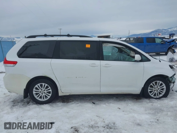2014 Toyota Sienna XLE with VIN 5TDYK3DC9ES442525, listed as a IAAI auction lot 41502770 with Not provided miles and . Bid and sale history available at DreamBid. Image 13.