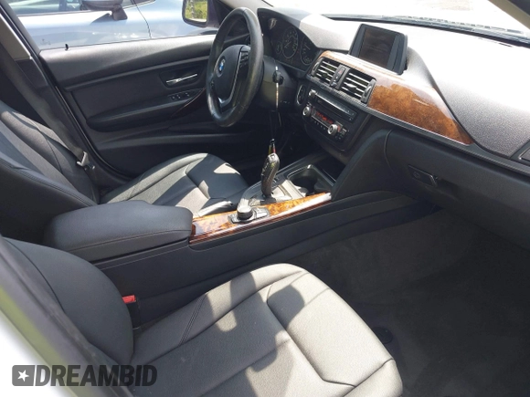 2014 BMW 3 Series 328i with VIN WBA3C1C5XEK107826, listed as a IAAI auction lot 42481701 with 104,151 mi miles and . Bid and sale history available at DreamBid. Image 5.