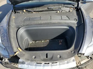 2022 Tesla Model Y Performance z VIN 7SAYGDEF5NF338301, wystawiony jako Copart lot #78189114 z przebiegiem 55 881 mil mil oraz Szkody całkowita. Historia ofert i sprzedaży dostępna na DreamBid. Obrazek 12.