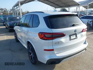 2022 BMW X5 sDrive40i with VIN 5UXCR4C0XN9N25946, listed as a IAAI auction lot 41957291 with 34,286 mi miles. Bid and sale history available at carsss.com. Image 3.