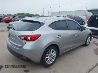 2014 Mazda 3 i Touring with VIN 3MZBM1L74EM116489, listed as a IAAI auction lot 41932973 with 89,817 mi miles and . Bid and sale history available at DreamBid. Image 4.