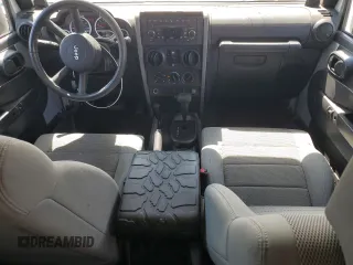 2007 Jeep Wrangler Unlimited Sahara with VIN 1J8GA59137L181360, listed as a Copart auction lot 62311225 with 151,393 mi miles and Salvage title. Bid and sale history available at DreamBid. Image 8.