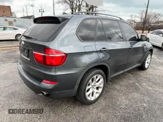 2011 BMW X5 35i with VIN 5UXZV4C58BL401755, listed as a Copart auction lot 49190535 with 104,082 mi miles and Clean Title. Bid and sale history available at carsss.com. Image 4.