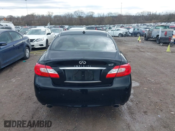 2013 Infiniti M37 with VIN JN1BY1AP9DM513719, listed as a IAAI auction lot 41543165 with 141,488 mi miles. Bid and sale history available at carsss.com. Image 16.