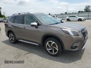 2023 Subaru Forester Touring with VIN JF2SKARC4PH492888, listed as a Copart auction lot 58743735 with 12,015 mi miles and Salvage title. Bid and sale history available at DreamBid. Image 4.