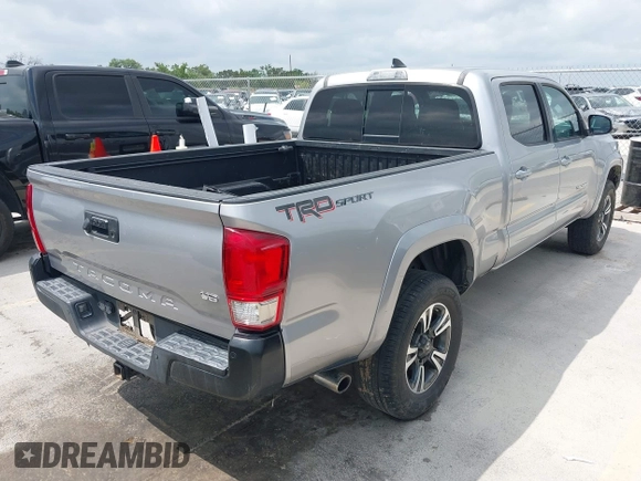 2017 Toyota Tacoma SR5 with VIN 3TMBZ5DN9HM011444, listed as a IAAI auction lot 42138388 with 133,857 mi miles and . Bid and sale history available at DreamBid. Image 4.